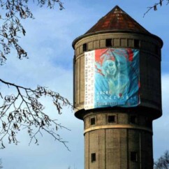 baner z okazji wernisażu w zabytkowej wieży ciśnień w Mińsku Mazowieckim